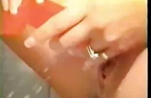 porn video Colored Bitch plays around on white pussy